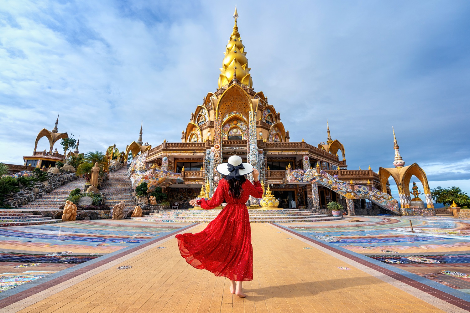 Woman standing at Wat Phra That Pha Son Kaew Temple in Khao Kho